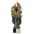 Relikwiarz z figurą Papieża Św. JP II ze srebrnym herbem i ziemią świetą. 37 cm